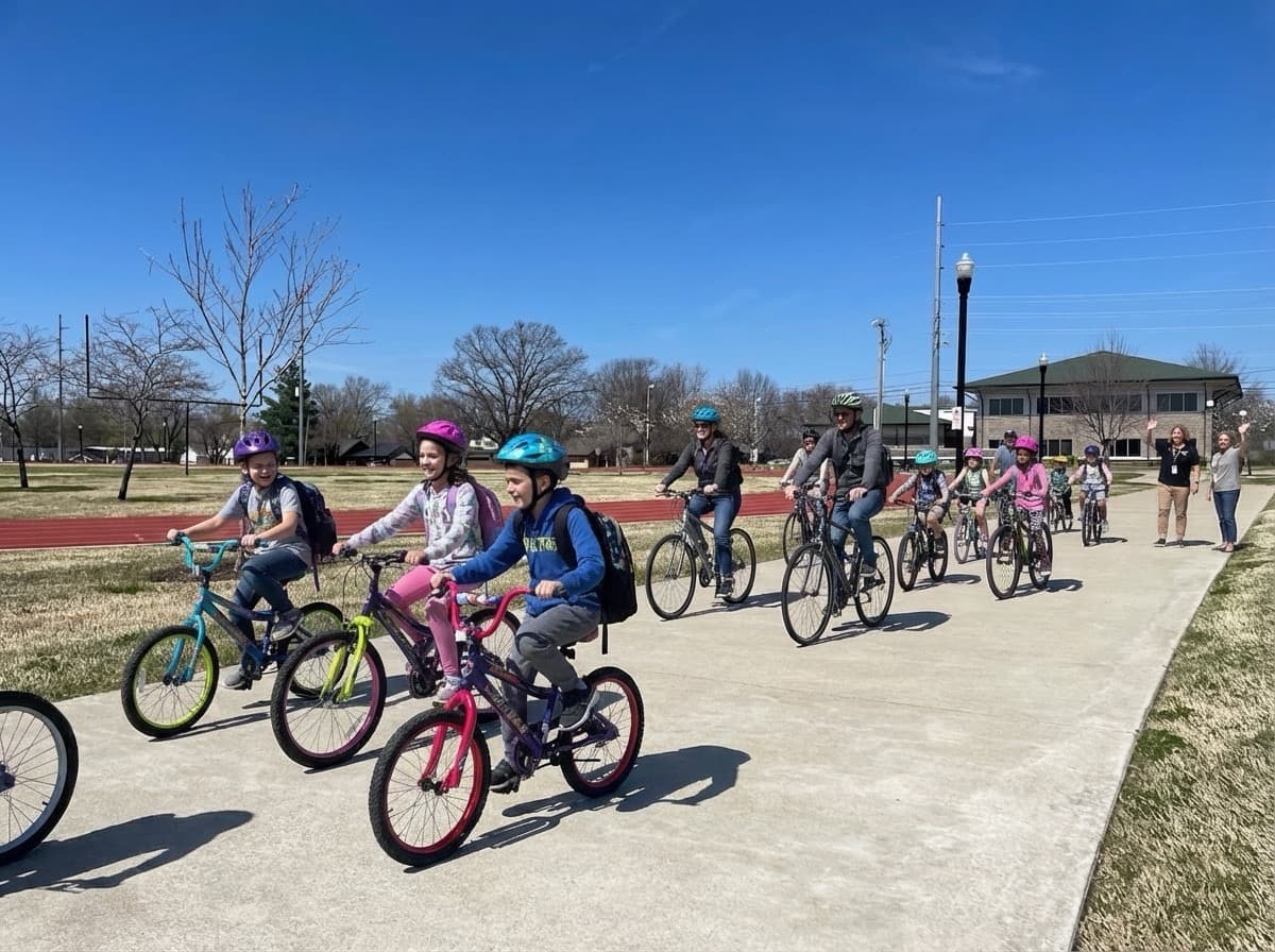 Children and parents biking together on a sunny day